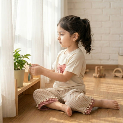 Gingham Whimsy: Girls' Cream Tee & Striped Pom-Pom Pant Set