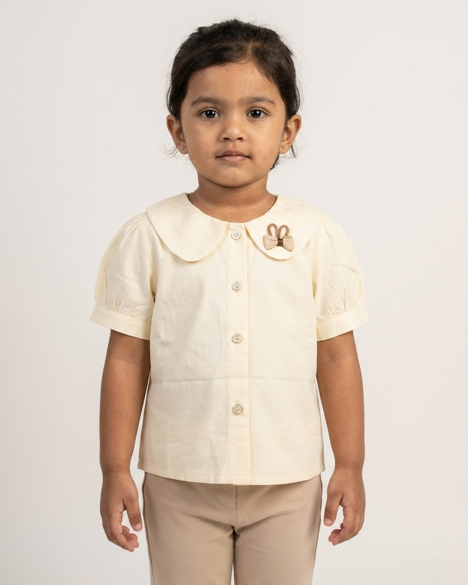 Ivory Bloom: Girls' Peter Pan Collar Blouse with Crochet Bunny Accent